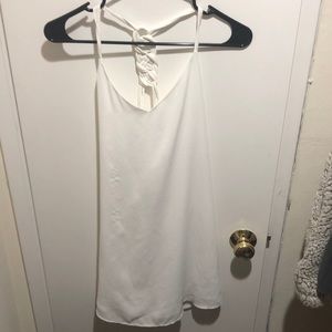 White mini dress with braided detail in the back